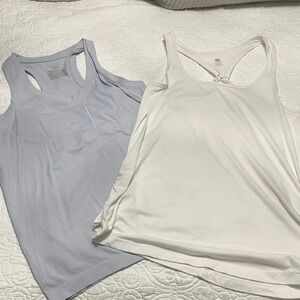 Two GAIAM Women's White and Light Lavender Tank Tops